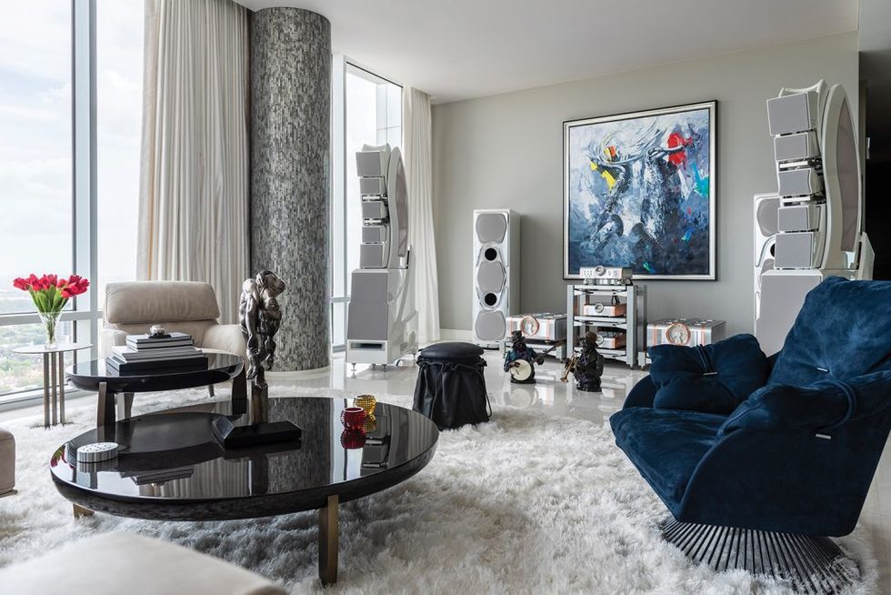 The multi-million-dollar sound system includes speakers on the far ends of the living room and a world-class arrangement of subwoofers and amplifiers near the center.