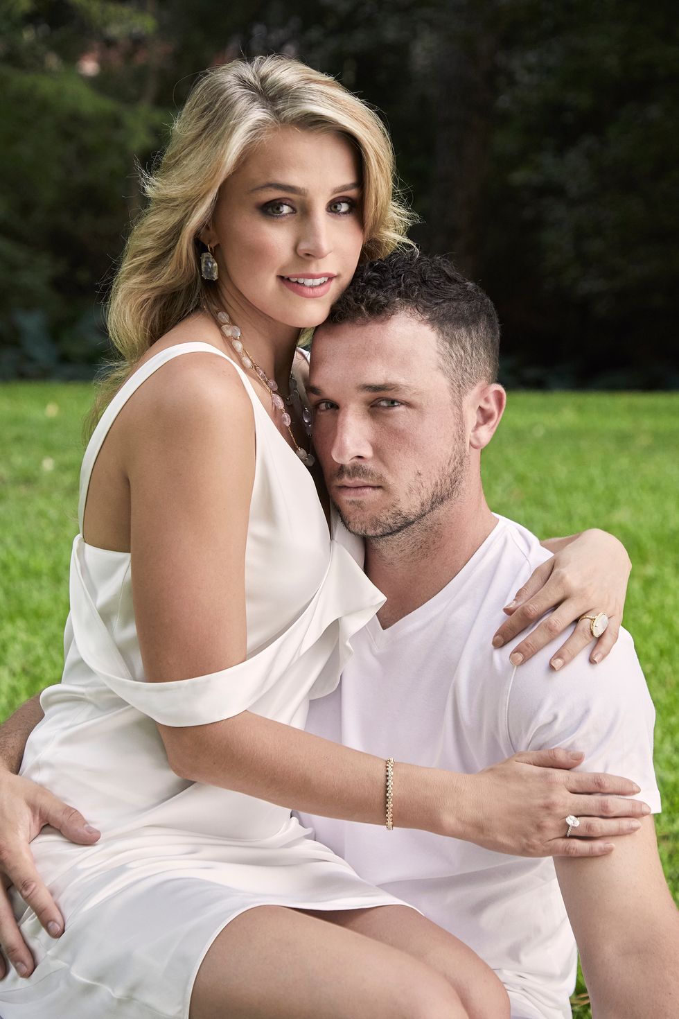 Howard is wearing a Helmut Lang dress from Tootsies with jewelry from Deutsch Houston, and Bregman dons a Pya t-shirt from M Penner.