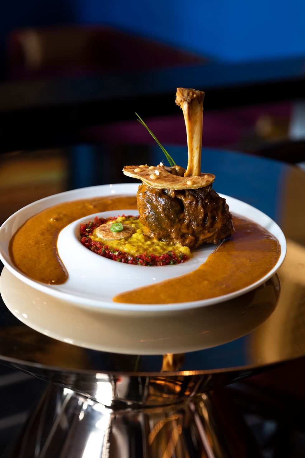 Nalli Hihari is a lamb shank accompanied by cauliflower ‘risotto’ and pepper gremolata