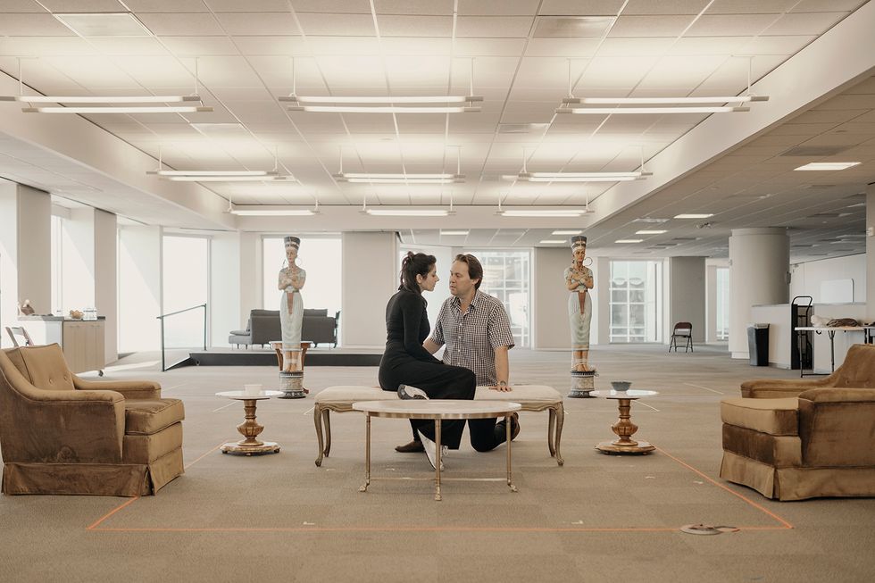 Alley actors Lisa Birnbaum and Christian McKay rehearse for an upcoming play in a borrowed high-rise space since the company’s theater flooded. PHOTO BY TODD SPOTH