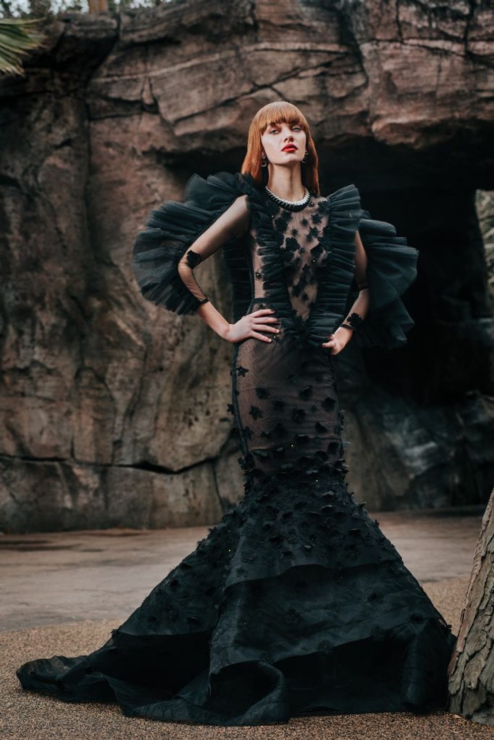 Black M Mermaid dress, $2,375, by custom order. With earrings, $37,800, and necklace, $168,500, both by David Webb at Tenenbaum Jewelers. 